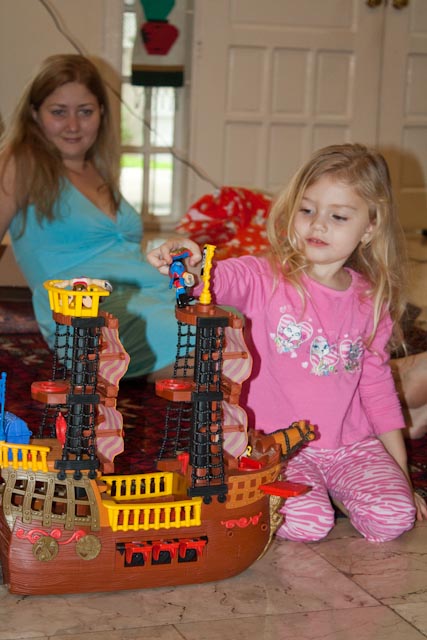 Playing with her pirate ship.