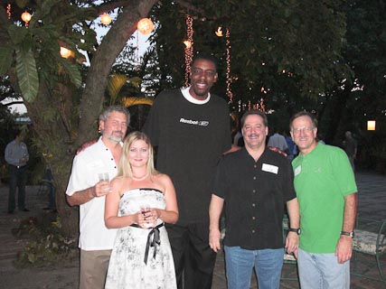 The Ambassador loves Basketball, so when the Harlem Globetrotters came to town, she had them to her residence for a reception.  This is Skyscraper Alleyne, together with Tanya and I, and two friends from the embassy.  At 7'2" Skyscraper is the tallest player on the team.